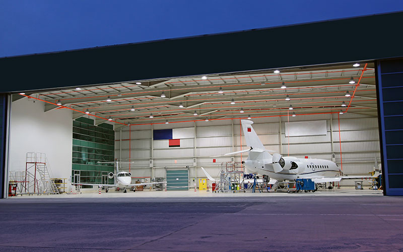 Hangar door installation service repair on hydraulic doors - powerlift - Northwest U.S.A