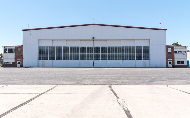 Hangar door installation service repair on hydraulic doors - powerlift - Northwest U.S.A